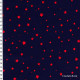 Tissu Poussière d'étoiles bleu nuit étoiles rouges, x10cm dans LINNAMORATA par Couture et Cie